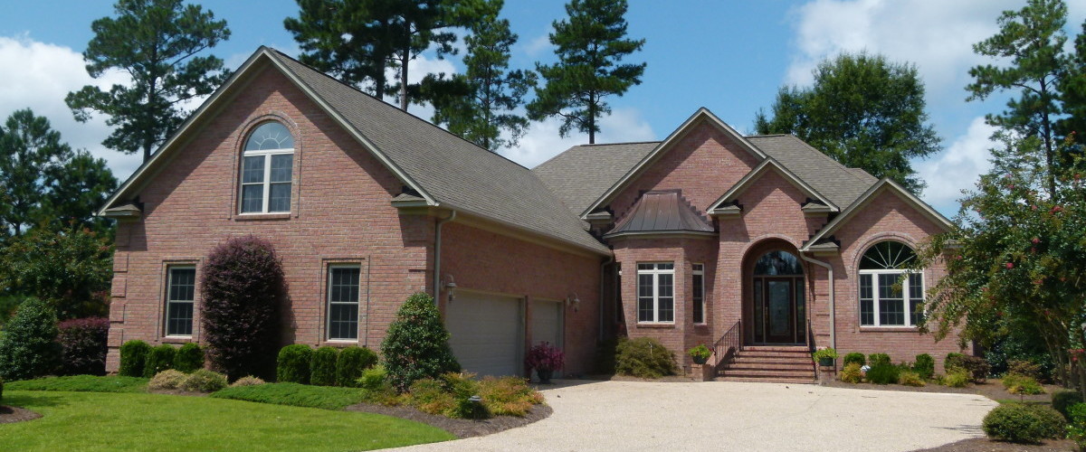 Eastern NC Custom Built Home with brick facade and side entry 2 car garage